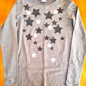 Long sleeve sparkle star tee.